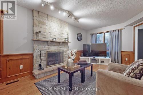30 Adirondack Cres, Brampton, ON - Indoor Photo Showing Living Room With Fireplace