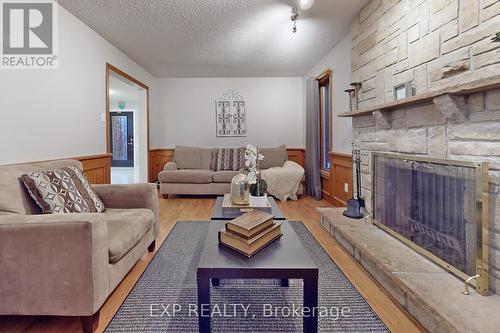 30 Adirondack Crescent, Brampton, ON - Indoor Photo Showing Living Room With Fireplace