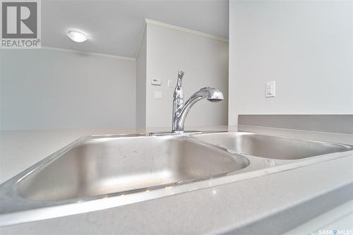 249 322 Lewin Way, Saskatoon, SK - Indoor Photo Showing Kitchen With Double Sink