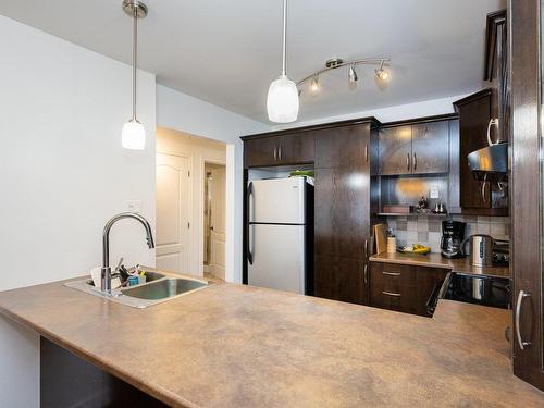 Cuisine - 201-2266 100E Avenue, Laval (Chomedey), QC - Indoor Photo Showing Kitchen With Double Sink