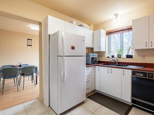 Cuisine - 301-8900 Boul. Rivard, Brossard, QC - Indoor Photo Showing Kitchen With Double Sink