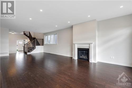 404 Barrett Farm Drive, Ottawa, ON - Indoor Photo Showing Living Room With Fireplace