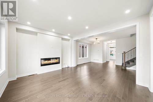 36 Sam Battaglia Cres, Georgina, ON - Indoor Photo Showing Living Room With Fireplace