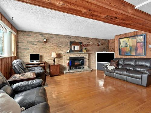 Family room - 3337 Rue Rolland, Longueuil (Le Vieux-Longueuil), QC - Indoor Photo Showing Living Room With Fireplace