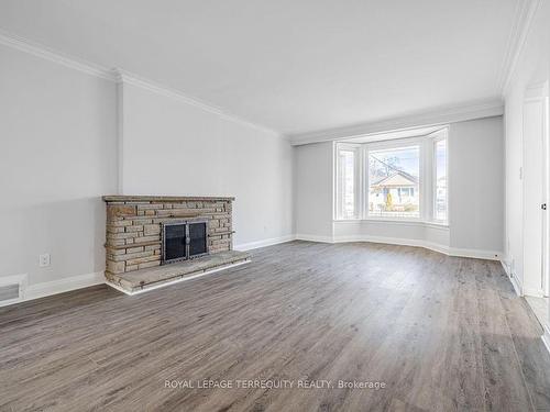 Main-64 Richardson Ave, Toronto, ON - Indoor Photo Showing Living Room With Fireplace