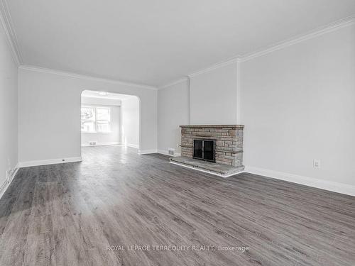 Main-64 Richardson Ave, Toronto, ON - Indoor Photo Showing Living Room With Fireplace