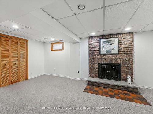 7-1771 Hyde Mill Cres, Mississauga, ON - Indoor Photo Showing Basement With Fireplace