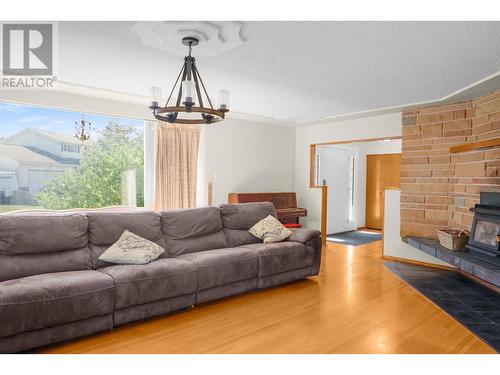 9 Oersted Street, Kitimat, BC - Indoor Photo Showing Living Room With Fireplace