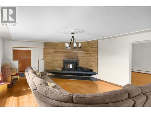 9 Oersted Street, Kitimat, BC - Indoor Photo Showing Living Room With Fireplace