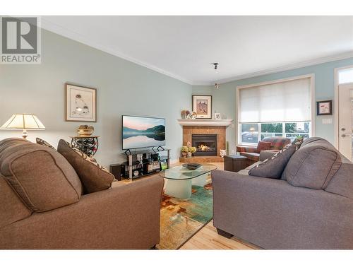 331 Chardonnay Avenue, Oliver, BC - Indoor Photo Showing Living Room With Fireplace