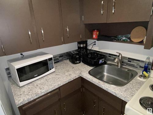 4943 Chalmers Av, Swan Hills, AB - Indoor Photo Showing Kitchen With Double Sink