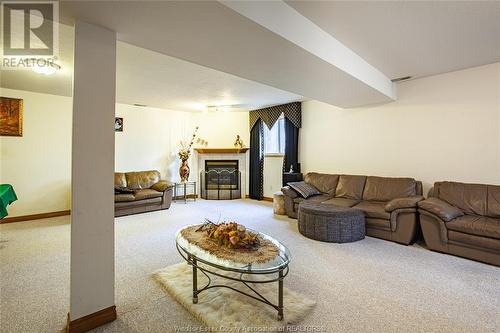 4430 Cherry Hill Road, Windsor, ON - Indoor Photo Showing Living Room With Fireplace