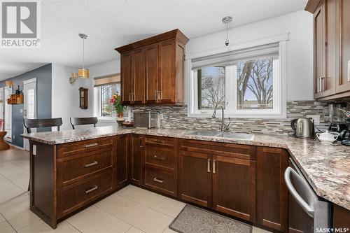 1213 Carleton Street, Moose Jaw, SK - Indoor Photo Showing Kitchen With Double Sink