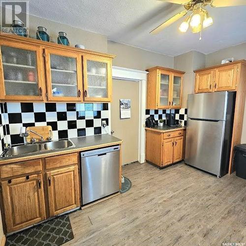 129 11Th Street E, Prince Albert, SK - Indoor Photo Showing Kitchen With Stainless Steel Kitchen With Double Sink