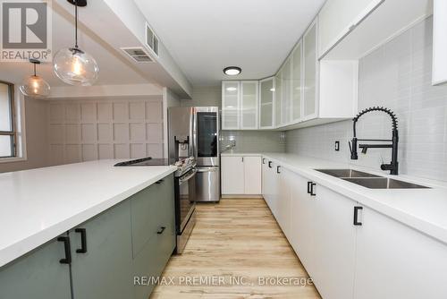 #516 -2835 Islington Ave, Toronto, ON - Indoor Photo Showing Kitchen With Double Sink With Upgraded Kitchen