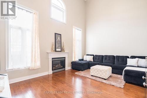 113 Centre St, Essa, ON - Indoor Photo Showing Living Room With Fireplace