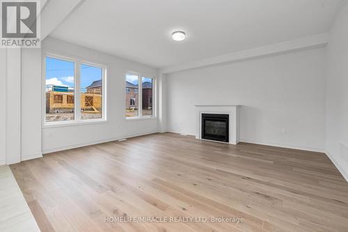 66 Sparrow Way, Adjala-Tosorontio, ON - Indoor Photo Showing Living Room With Fireplace