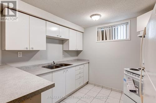 Lower - 64 Adrian Crescent, Markham, ON - Indoor Photo Showing Kitchen With Double Sink