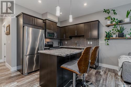 112 415 Maningas Bend, Saskatoon, SK - Indoor Photo Showing Kitchen With Upgraded Kitchen