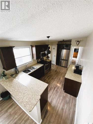 349 Hawkes Street, Balgonie, SK - Indoor Photo Showing Kitchen With Double Sink