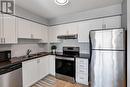 #609 -60 Town Centre Crt, Toronto, ON  - Indoor Photo Showing Kitchen With Stainless Steel Kitchen With Double Sink 