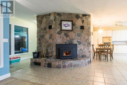 1502 County Rd 64, Brighton, ON - Indoor Photo Showing Living Room With Fireplace