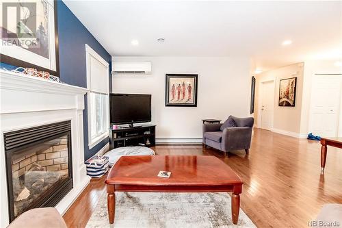 3 Caesar'S Court, Quispamsis, NB - Indoor Photo Showing Living Room With Fireplace