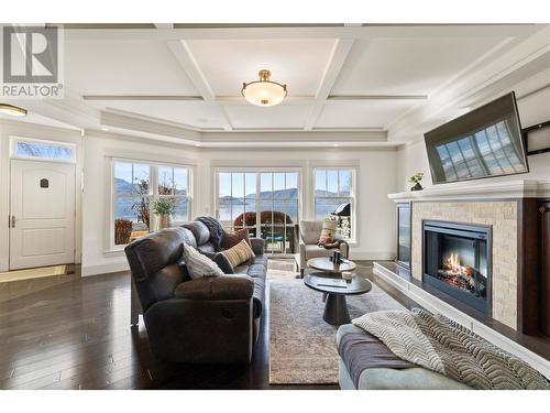 4026 Beach Avenue Unit# C, Peachland, BC - Indoor Photo Showing Living Room With Fireplace