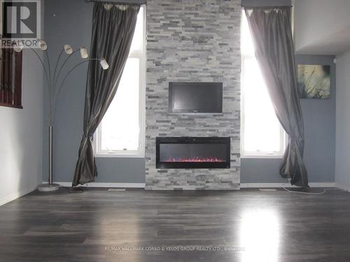 353 Westmeadow Drive, Kitchener, ON - Indoor Photo Showing Living Room With Fireplace