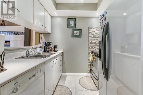#233 -65 Bristol Rd E, Mississauga, ON - Indoor Photo Showing Kitchen With Double Sink