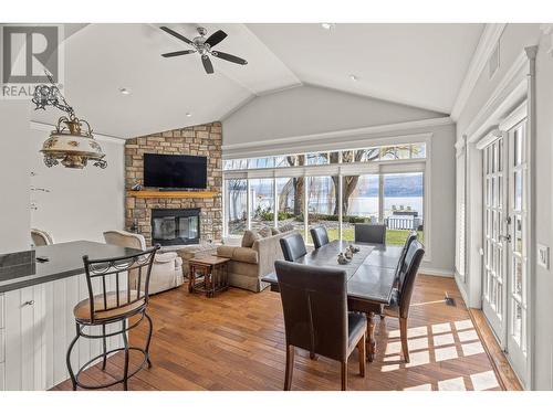 1571 Pritchard Drive, West Kelowna, BC - Indoor Photo Showing Dining Room With Fireplace