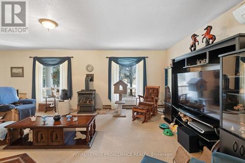 374 Scuttlehole Road, Belleville, ON - Indoor Photo Showing Living Room With Fireplace