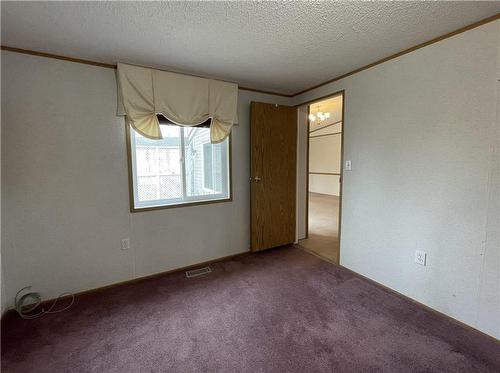 21 Sandpiper Bay, Brandon, MB - Indoor Photo Showing Other Room