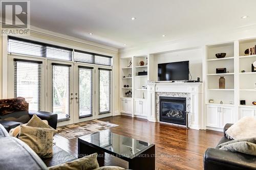42 Hilldowntree Rd, Toronto, ON - Indoor Photo Showing Living Room With Fireplace