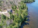 Aerial photo - 308 Ch. Du Prospecteur, Amherst, QC  - Outdoor With Body Of Water With View 