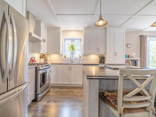 Aerial photo - 308 Ch. Du Prospecteur, Amherst, QC - Indoor Photo Showing Kitchen With Upgraded Kitchen