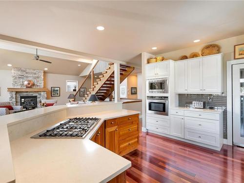 759 Sea Dr, Central Saanich, BC - Indoor Photo Showing Kitchen With Fireplace