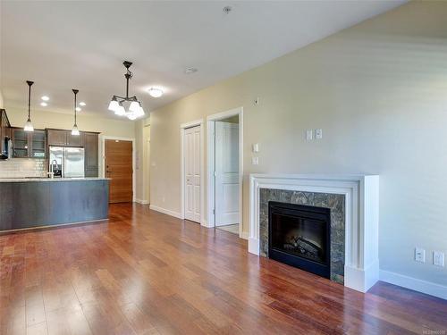 308-201 Nursery Hill Dr, View Royal, BC - Indoor Photo Showing Living Room With Fireplace