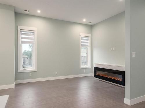 464 Hampstead St, Parksville, BC - Indoor Photo Showing Other Room With Fireplace