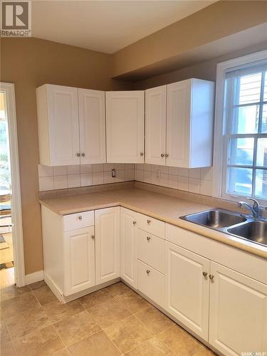 420 Cumberland Avenue S, Saskatoon, SK - Indoor Photo Showing Kitchen With Double Sink