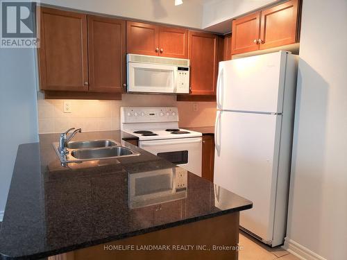 610 - 19 Barberry Place, Toronto, ON - Indoor Photo Showing Kitchen With Double Sink
