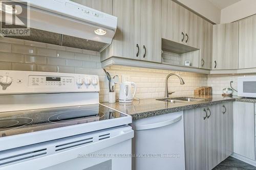 #26 -2445 Homelands Dr, Mississauga, ON - Indoor Photo Showing Kitchen With Double Sink