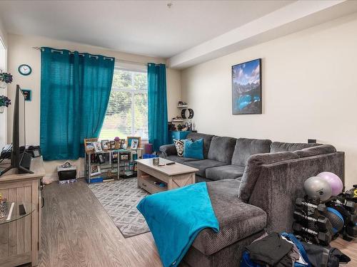 207-4960 Songbird Pl, Nanaimo, BC - Indoor Photo Showing Living Room