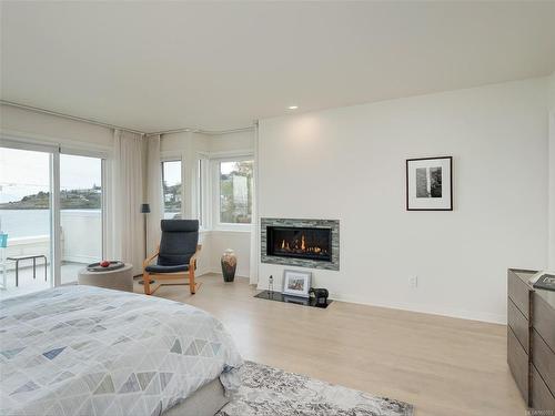 453 Oliver St, Oak Bay, BC - Indoor Photo Showing Bedroom With Fireplace