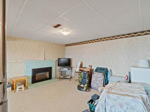 234 Monashee Place, Kamloops, BC - Indoor Photo Showing Bedroom With Fireplace