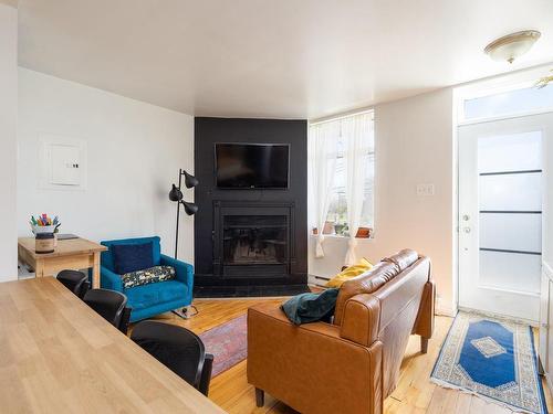 Living room - 5015 Boul. Lasalle, Montréal (Verdun/Île-Des-Soeurs), QC - Indoor Photo Showing Living Room With Fireplace