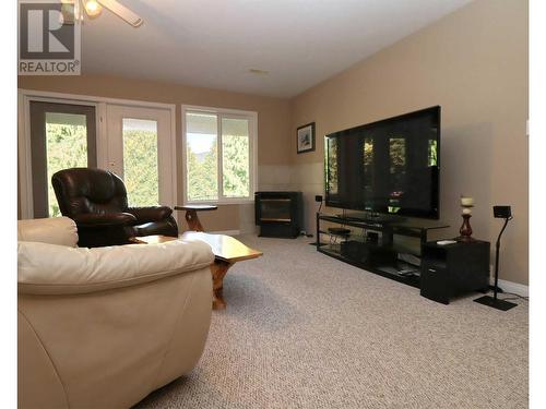4830 Goodwin Road, Eagle Bay, BC - Indoor Photo Showing Living Room With Fireplace