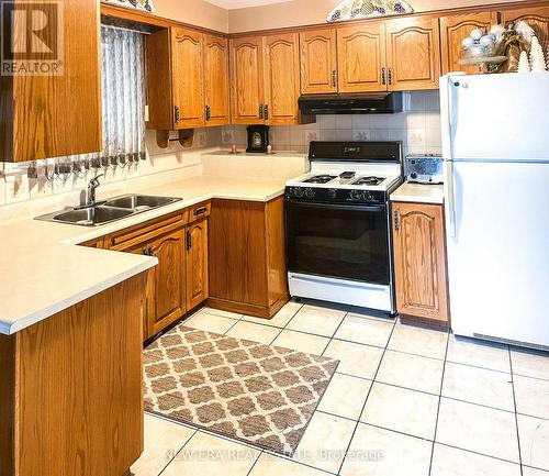 49 Honbury Rd, Toronto, ON - Indoor Photo Showing Kitchen With Double Sink
