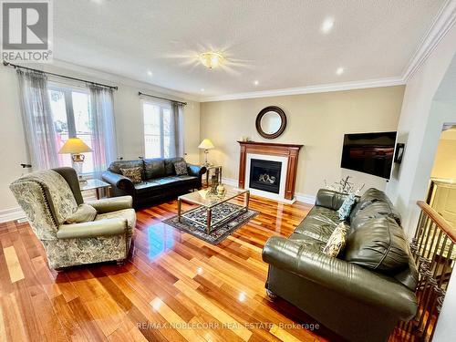 2139 Helmsley Ave, Oakville, ON - Indoor Photo Showing Living Room With Fireplace
