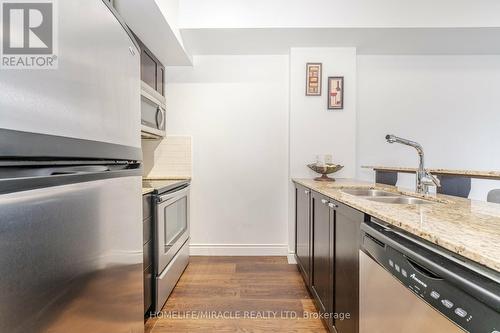 #708 -103 The Queens Way, Toronto, ON - Indoor Photo Showing Kitchen With Double Sink